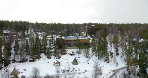 Contemporary building in the forest near the lake shore in Finland photo