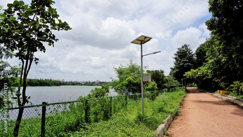 Landscape view of walking lane of Agara lake. Well maintained lake photo