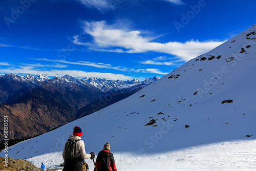 trekking on the peak of Kedarkantha mountain  of Uttarkhand, India in himalyan range in winter. photo