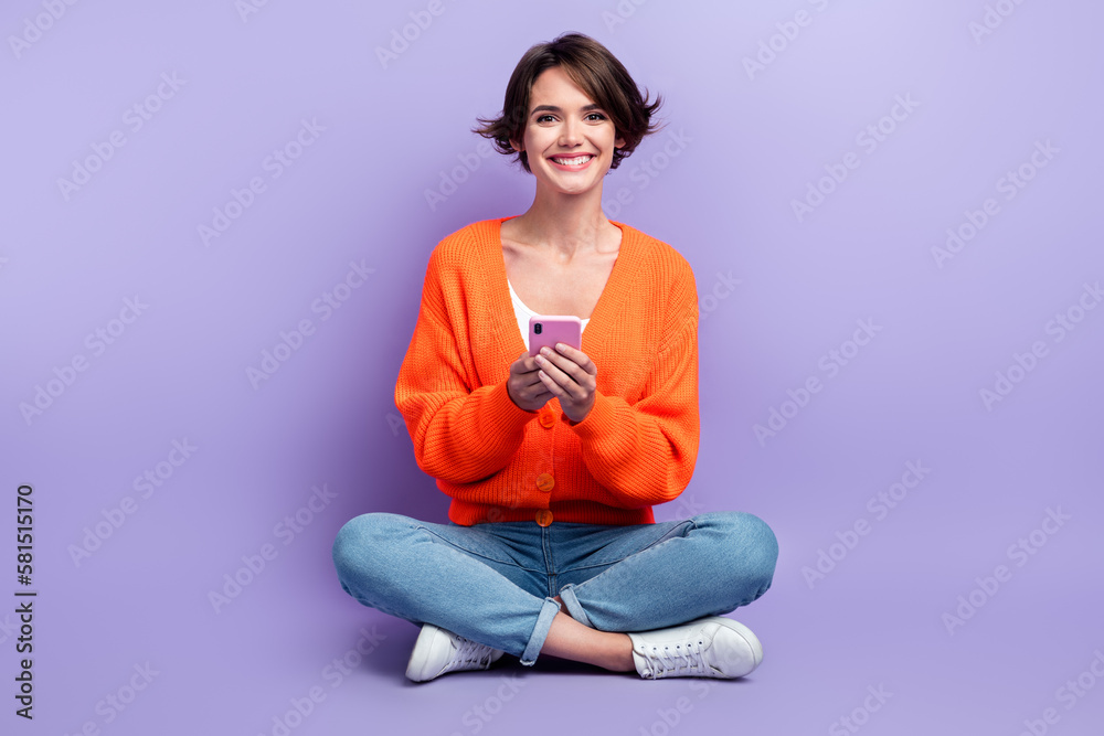 Full body photo advert of millennial funky optimist user gadget review woman promoter hold new apple smartphone isolated on violet color background