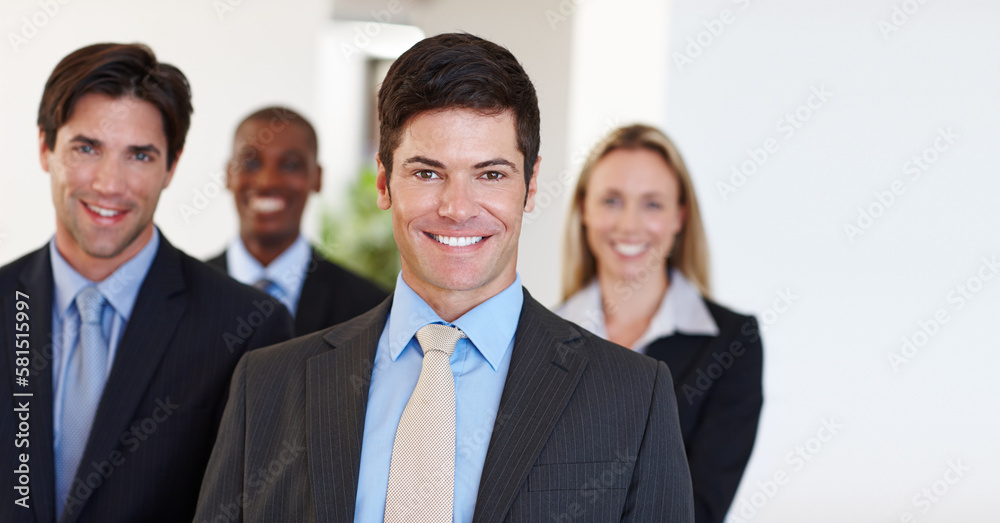 Diversity makes a business stronger. Portrait of a diverse group of business professionals standing indoors. Diversity makes a business stronger. Portrait of a diverse group of business professionals standing indoors.