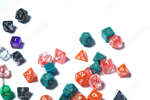 Gaming dices closeup on white background isolated for dungeons, dragons and fantasy roleplaying	 photo