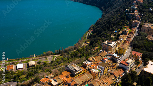 Aerial view of Castel Gandolfo, a town near Rome, on the Alban Hills, in Latium, central Italy. It is located in the Castelli Romani area of Lazio. It overlooks Lake Albano, a volcanic crater lake.