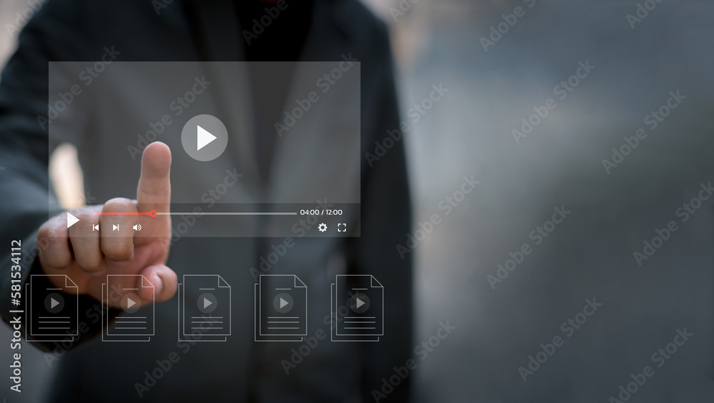 Man using mouse and keyboard for streaming online on virtual screen, watching video on internet, live concert, show or tutorial, content online. Man using mouse and keyboard for streaming online on virtual screen, watching video on internet, live concert, show or tutorial, content online.