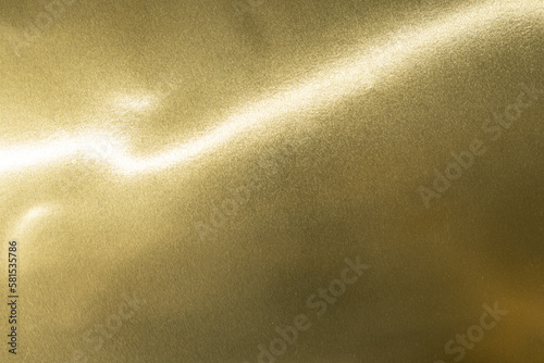Gold background, gold polished metal, steel texture.