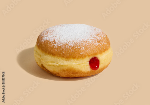 jelly donut on beige background photo