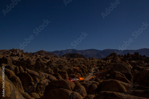 camping in the Alabama Hills, outside of Lone Pine, California, with views of the Eastern Sierra Nevada Mountains covered in snow. Mt langley and Mt Whitney can be seen.