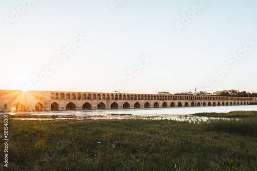 Isfahan, Iran - May 2022: SioSe Pol or Bridge of 33 arches, one of the oldest bridges of Esfahan and longest bridge on Zayandeh River