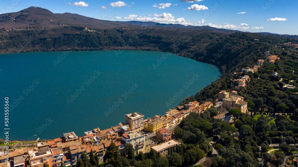 Aerial view of Castel Gandolfo, a town near Rome, on the Alban Hills, in Latium, central Italy. It is located in the Castelli Romani area of Lazio. It overlooks Lake Albano, a volcanic crater lake.