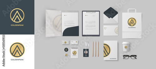 Branding design mockup set with golden logo and grey background. Premium corporate identity for financial or lawyer company with marble folder and wooden pencil.