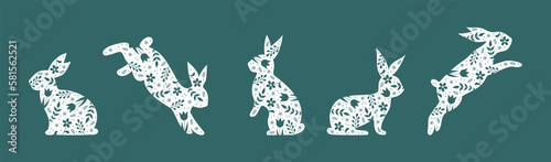Set of Easter bunnies with a floral pattern on a dark green background. Flat vector illustration