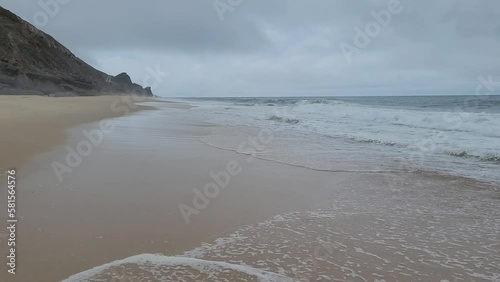 Stormy sky above the rough atlantic ocean in Portugal.