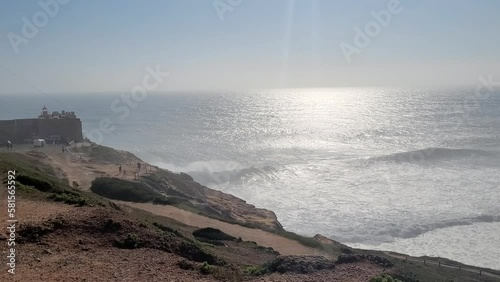 Set of big waves near the coast in Nazare, Portugal.