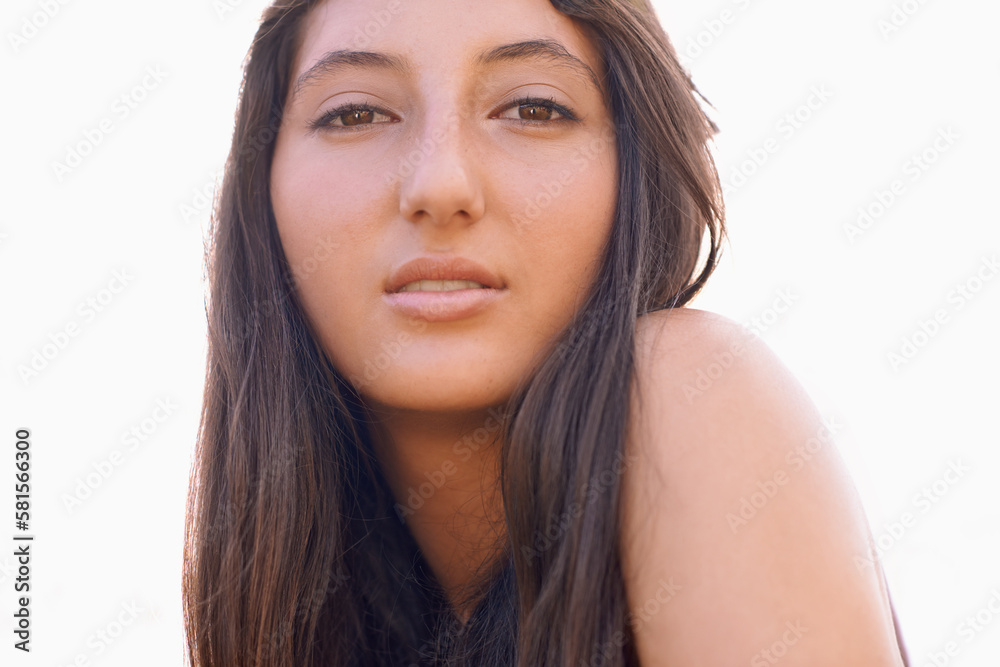 Theres confidence in her beauty. Portrait of an attractive teenage girl in the outdoors. Theres confidence in her beauty. Portrait of an attractive teenage girl in the outdoors.