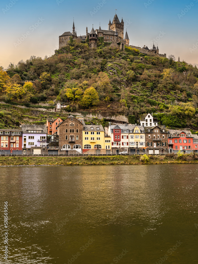 Cochem village colourful houses on on moselle river and the castle on the montain in Cochem-Zell district, Germany