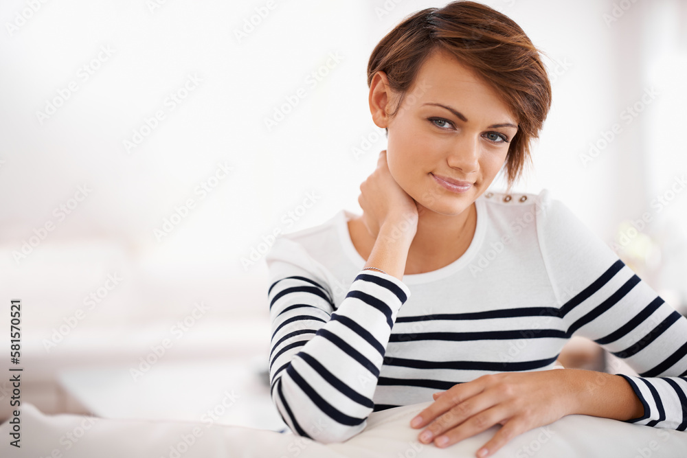 You cant hide that confidence. Portrait of a beautiful young woman relaxing at home. You cant hide that confidence. Portrait of a beautiful young woman relaxing at home.