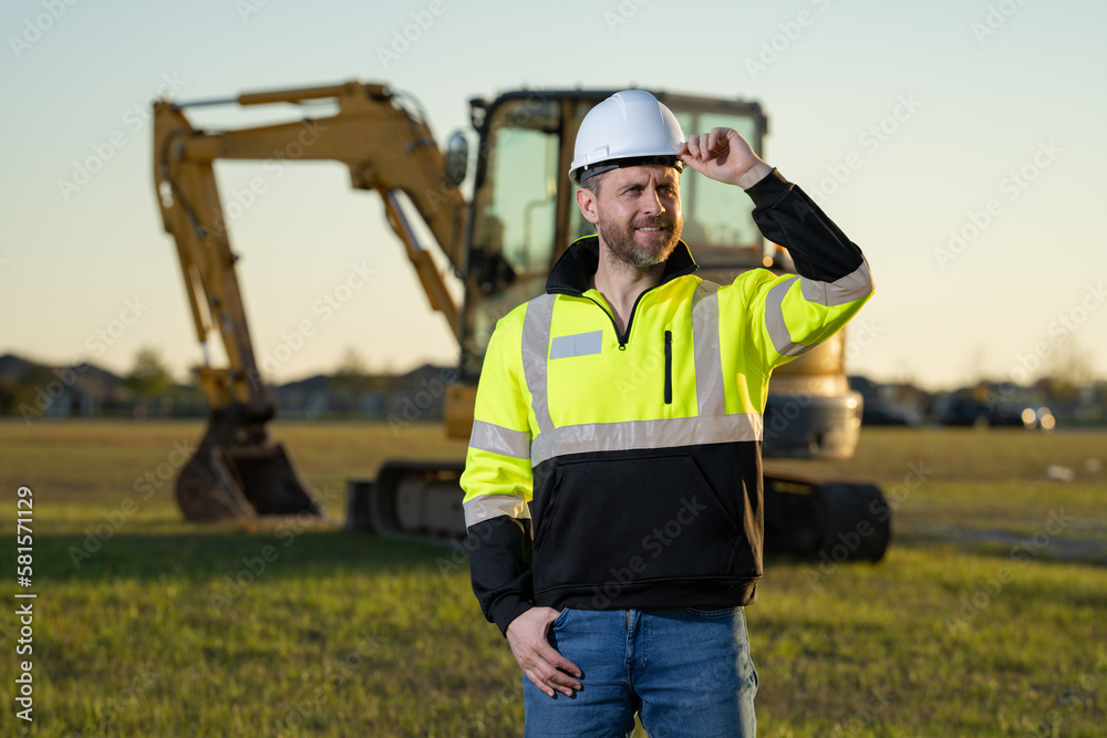 Worker at construction site. Builder in hardhat. Construction man with helmet. Worker at construction with helmet. Industry worker at construction building. Builder at site building with excavator. Worker at construction site. Builder in hardhat. Construction man with helmet. Worker at construction with helmet. Industry worker at construction building. Builder at site building with excavator.