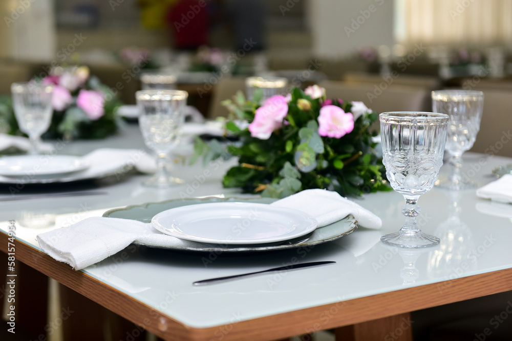 table set for a wedding reception, table setting, table setting in a restaurant, table setting for a dinner, restaurant interior