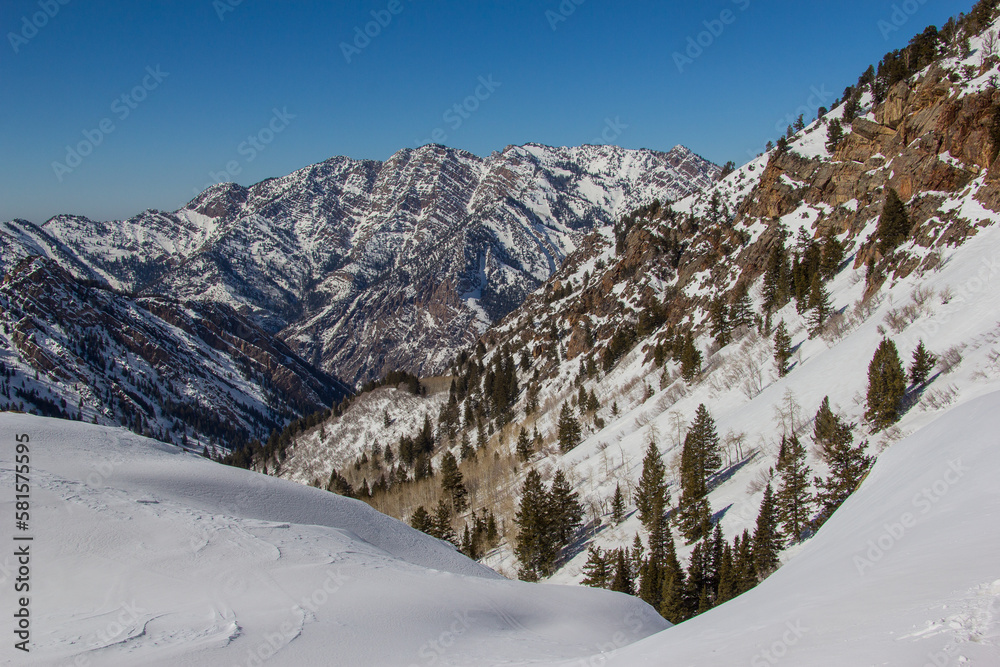 Hiking in the fresh snow of the wasatch mountains salt Lake City.