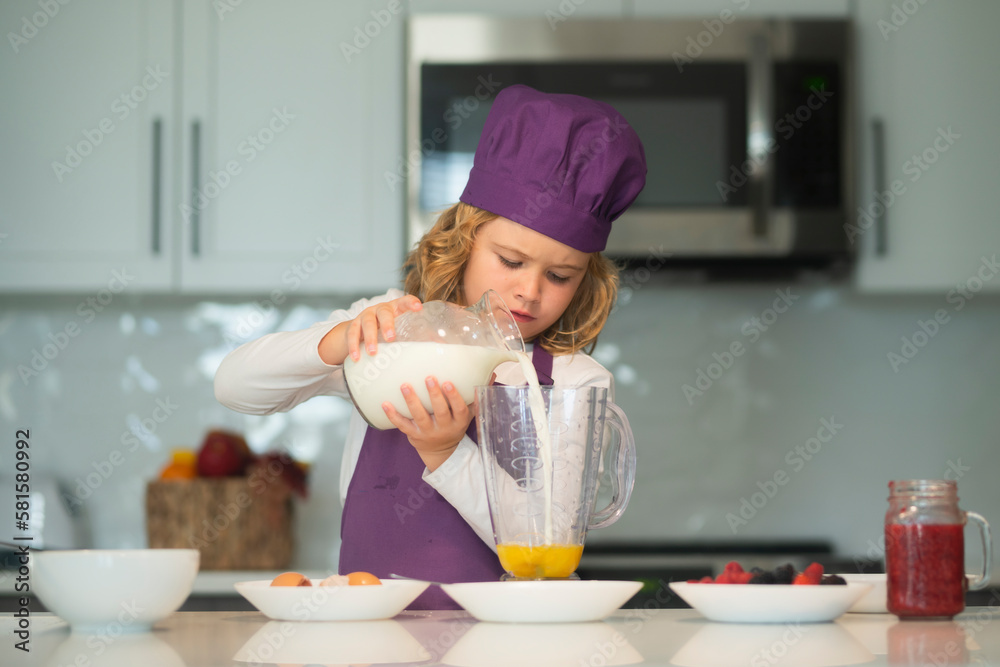 Chef child prepared ingredients. Child are preparing the dough, bake cookies in the kitchen. Chef child prepared ingredients. Child are preparing the dough, bake cookies in the kitchen.