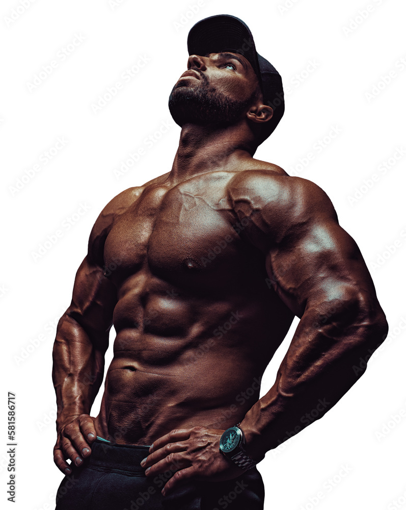 Obraz premium Young strong man bodybuilder in cap