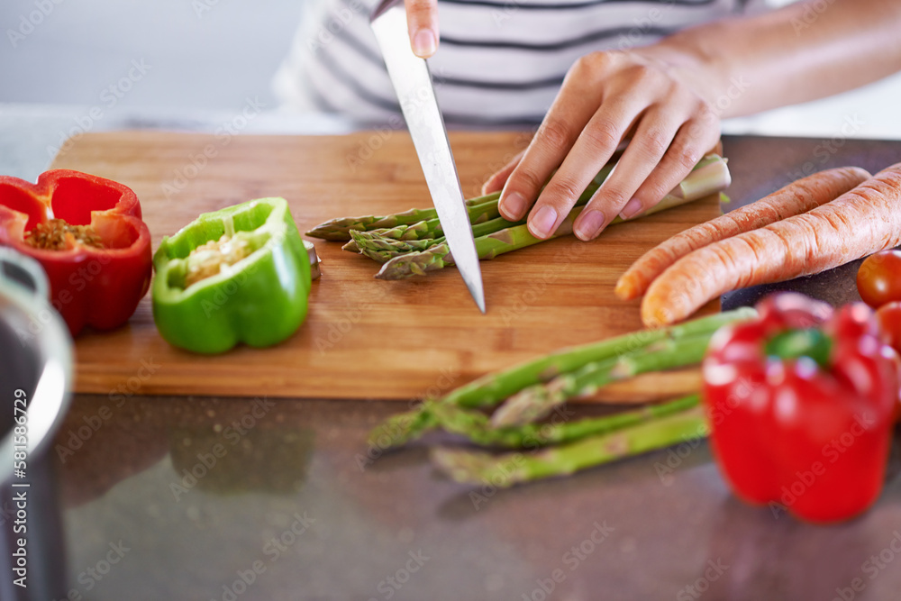 Ingredients for a healthy life. a woman chopping vegetables. Ingredients for a healthy life. a woman chopping vegetables.
