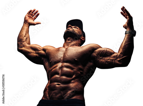Young strong man bodybuilder in cap