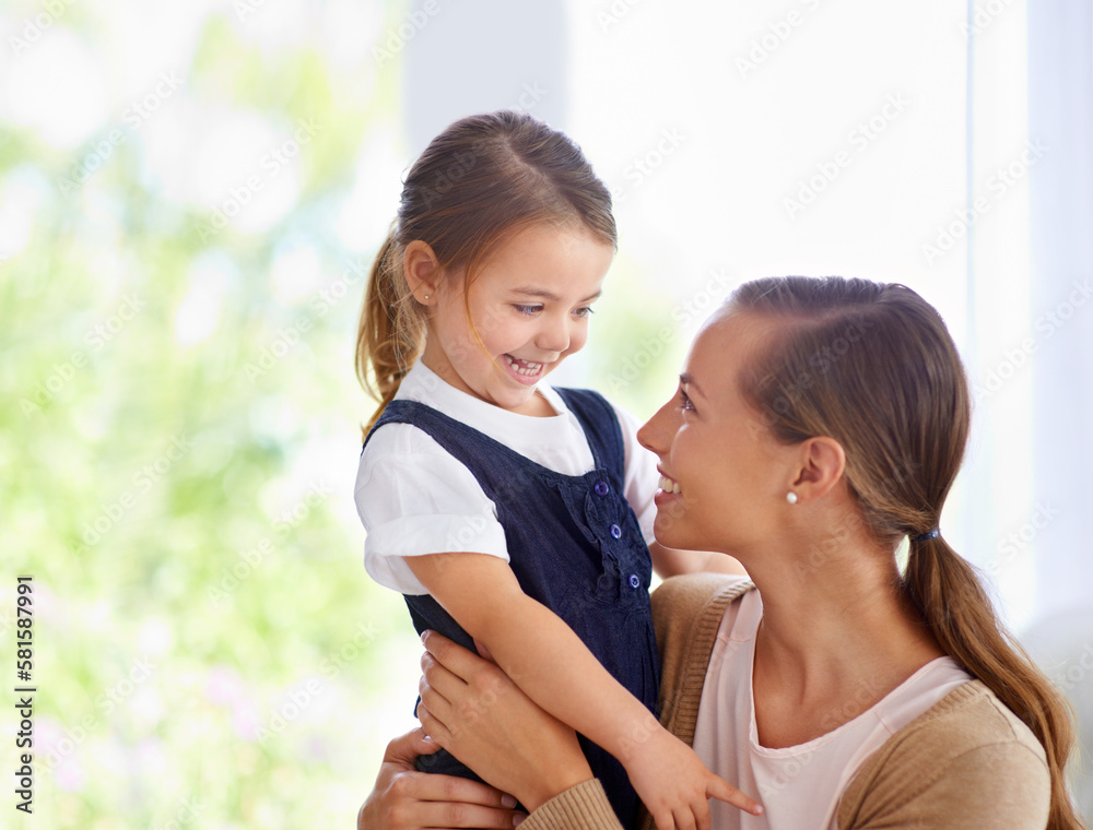 Sweet moments. a young mother and her little girl bonding at home. Sweet moments. a young mother and her little girl bonding at home.