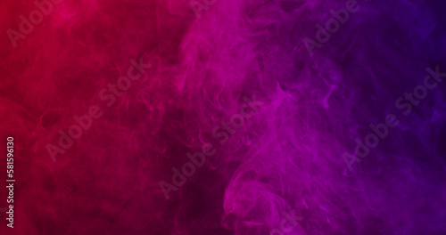 Close up of clouds of pink to purple smoke with copy space background