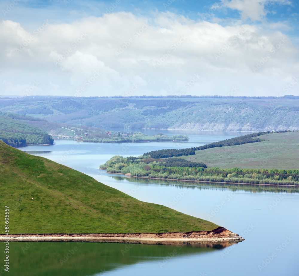Obraz premium Bakota (bay on Dnister river and historic submerged settlement) hazy spring view, Khmelnytskyi Oblast, Ukraine.