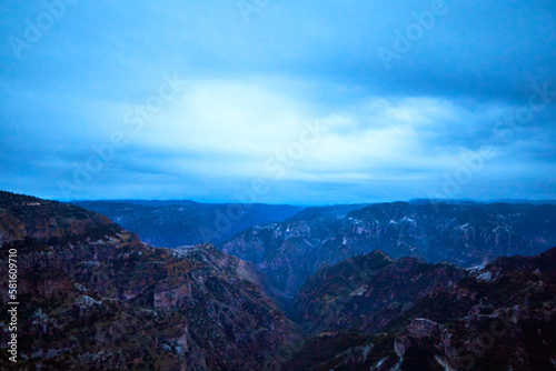 blue hour in canyon with cloudy sky  blue mountains  copper canyon in sierra tarahumara  chihuahua