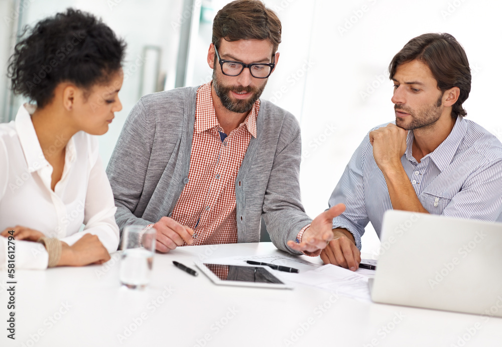The project is almost ready to go live. a group of a diverse group of business professionals having a meeting. The project is almost ready to go live. a group of a diverse group of business professionals having a meeting.