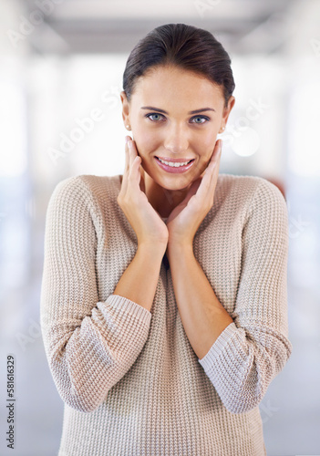 Oh stop with all the compliments, Im blushing. a stunning shy-looking brunette wearing a knit jersey.