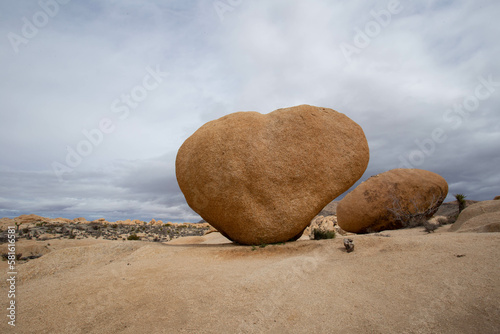heart rock on the sand