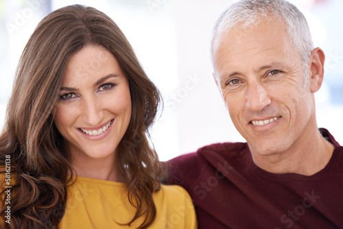 Love knows no bounds. a mature man and his younger wife enjoying time at at home.