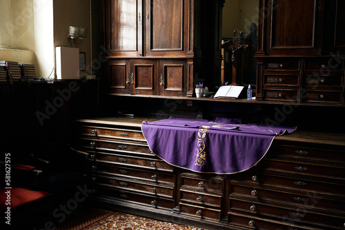 Obraz na płótnie Sacristy inside the catholic church, priest chasuble, lent, purple liturgical vestments w salonie