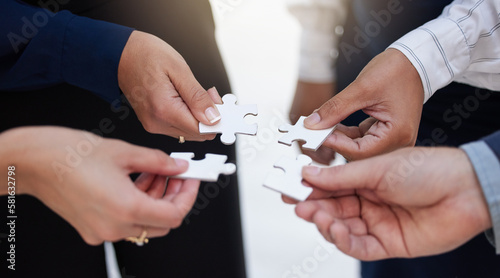Team  hands and puzzle for teamwork  solution and integration  synergy and collaboration. Hand  business people and jigsaw for strategy  support and partnership  innovation and unity in cooperation