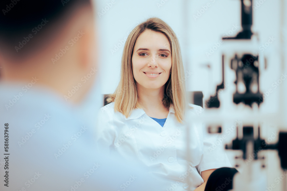 Smiling Doctor Consulting a Patient in her Office. Happy ophthalmologist explaining the diagnosis to her patient 
 - obrazy, fototapety, plakaty 