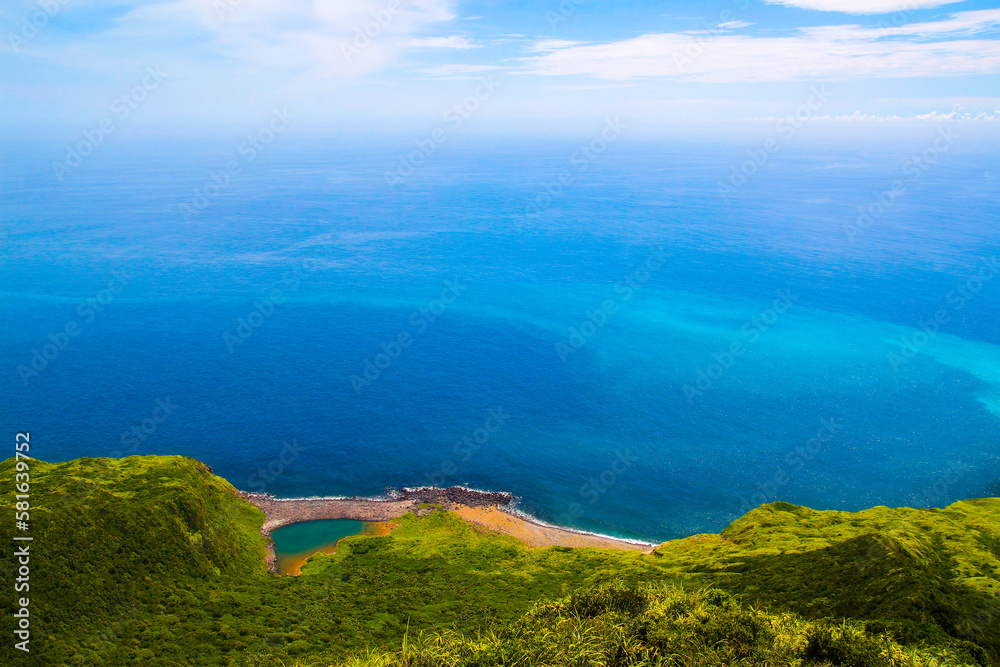 Guishan Island is a beautiful scenery which Tourists call it  “Turtle” with a tail and shell above the sea level. The sea is with blue gradient with the sky also named 