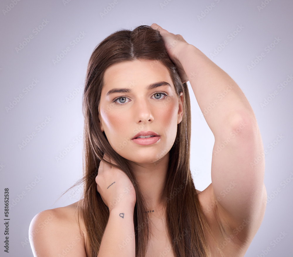 Fototapeta premium Face portrait, beauty and hair care of a woman in studio isolated on a background. Natural cosmetics, growth and confident female model with salon treatment for healthy keratin, texture and hairstyle
