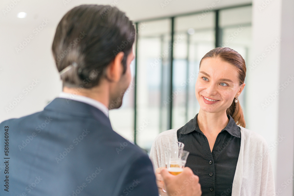 Corporate co-workers having drinks after meeting, People clinking glasses with sparkling wine indoors, Business people celebrating inside modern office. Corporate co-workers having drinks after meeting, People clinking glasses with sparkling wine indoors, Business people celebrating inside modern office.