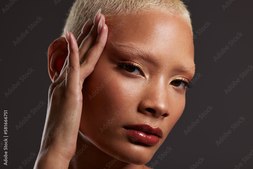 Fototapeta premium Beauty, makeup and lipstick, portrait of black woman in dark studio with platinum hair isolated on grey background. Art aesthetic, cosmetics and African model with hand on face and luxury spa facial.