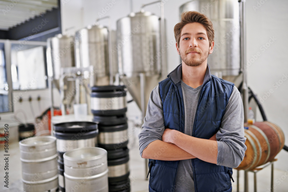I take my brewing seriously. a man working in a microbrewery.