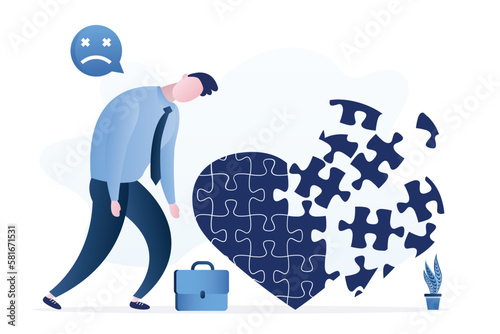 Unhappy businessman does not like his job. Lack of desire to go to work. Unloved business. Huge heart puzzle is broken into pieces. Frustration, burnout at work. Sad entrepreneur.