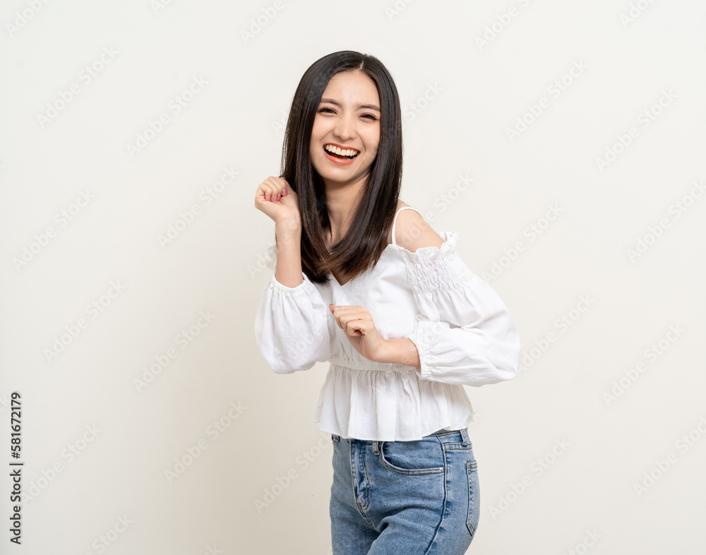 Beautiful smiling happy young asian woman age around 25 in white shirt. Charming female lady standing pose on isolated white background. Asian cute people looking camera confident with backdrop. Beautiful smiling happy young asian woman age around 25 in white shirt. Charming female lady standing pose on isolated white background. Asian cute people looking camera confident with backdrop.