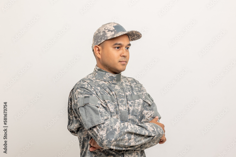 Asian man special forces soldier standing with arms crossed against on the field Mission. Commander Army soldier military defender of the nation in uniform standing on white background. Asian man special forces soldier standing with arms crossed against on the field Mission. Commander Army soldier military defender of the nation in uniform standing on white background.