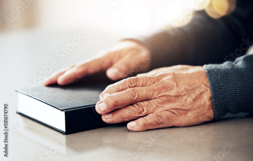 Bible book  worship or hands of old man for holy prayer  support or hope in Christianity or faith. Believe  zoom or catholic senior person praying to God in spiritual literature in religion or belief