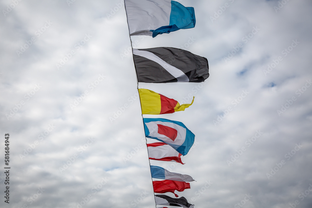 International maritime signal flags. Signal flags are displayed on the bridge over the Neva River during the Naval parade in St. Petersburg