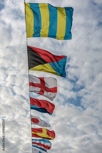 International maritime signal flags. Signal flags are displayed on the bridge over the Neva River during the Naval parade in St. Petersburg