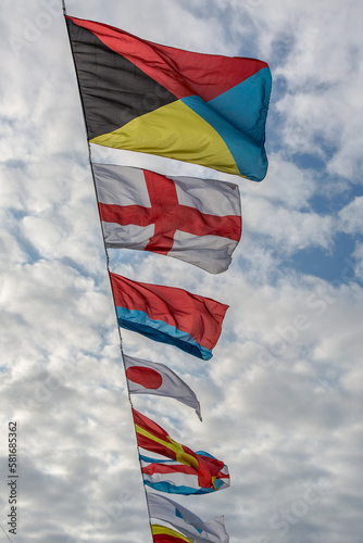 International maritime signal flags. Signal flags are displayed on the bridge over the Neva River during the Naval parade in St. Petersburg